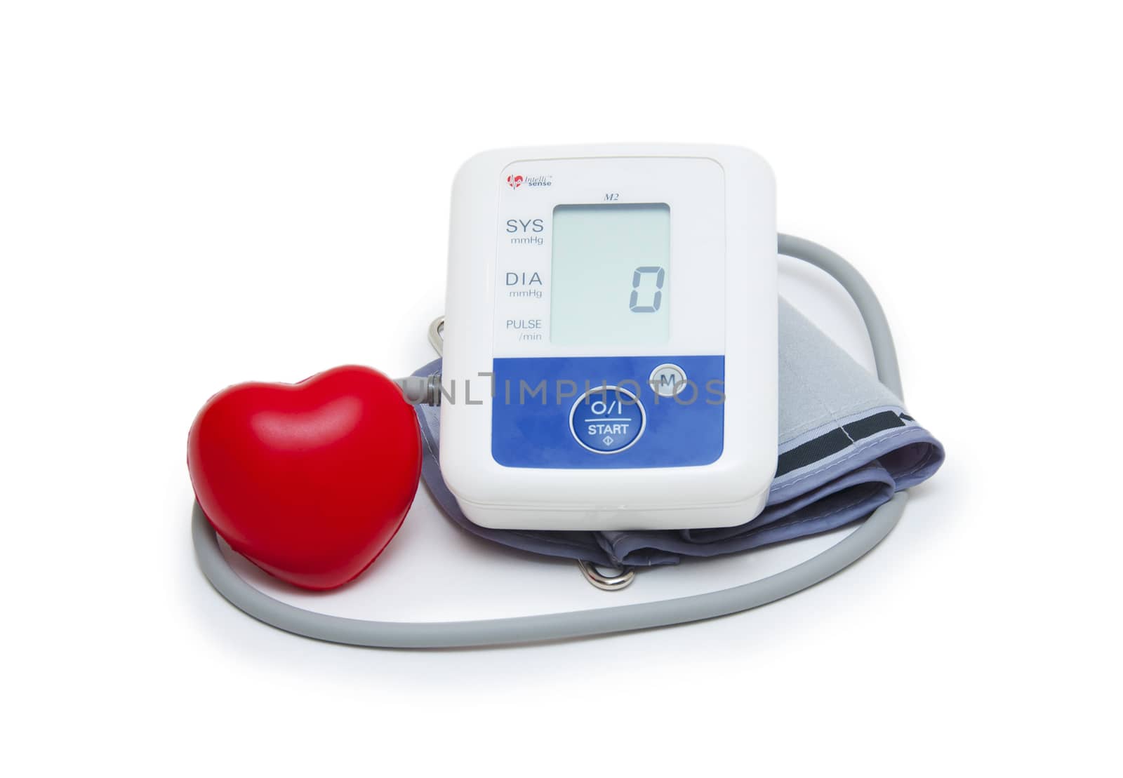 Digital blood pressure meter with love heart symbol on white background 