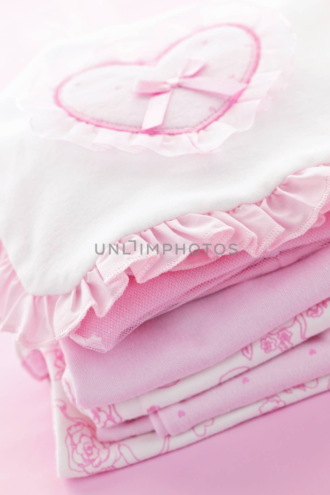 Pink infant girl clothing for baby shower