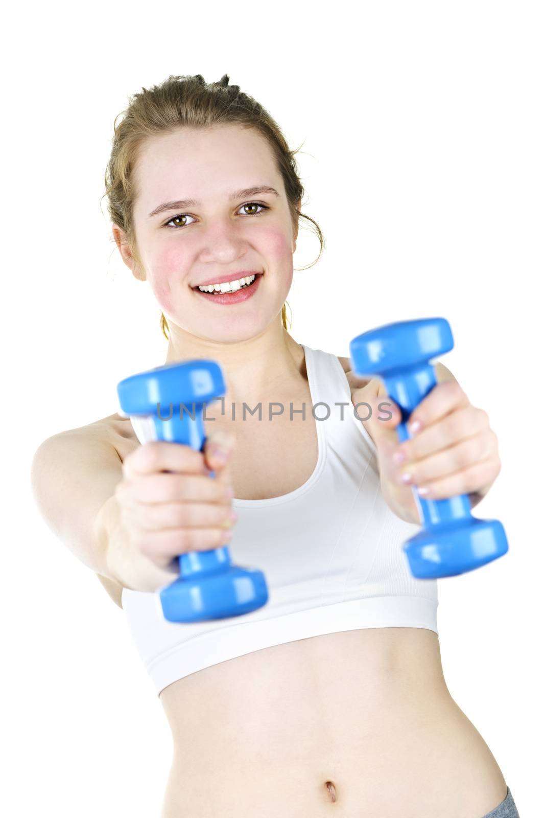 Healthy young woman working out with weights for fitness exercise