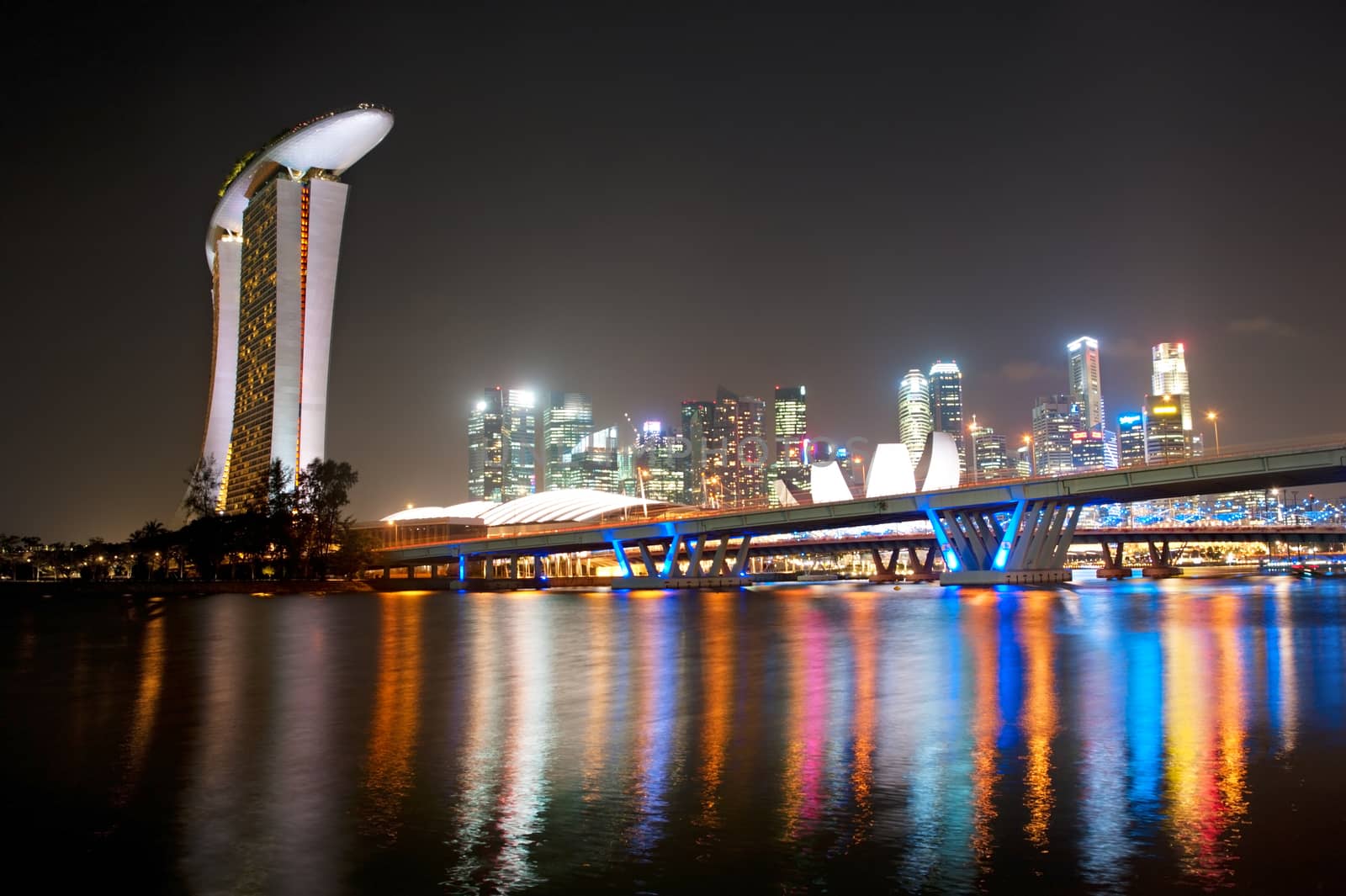 Skyline of Singapore at night with colorful neon lights