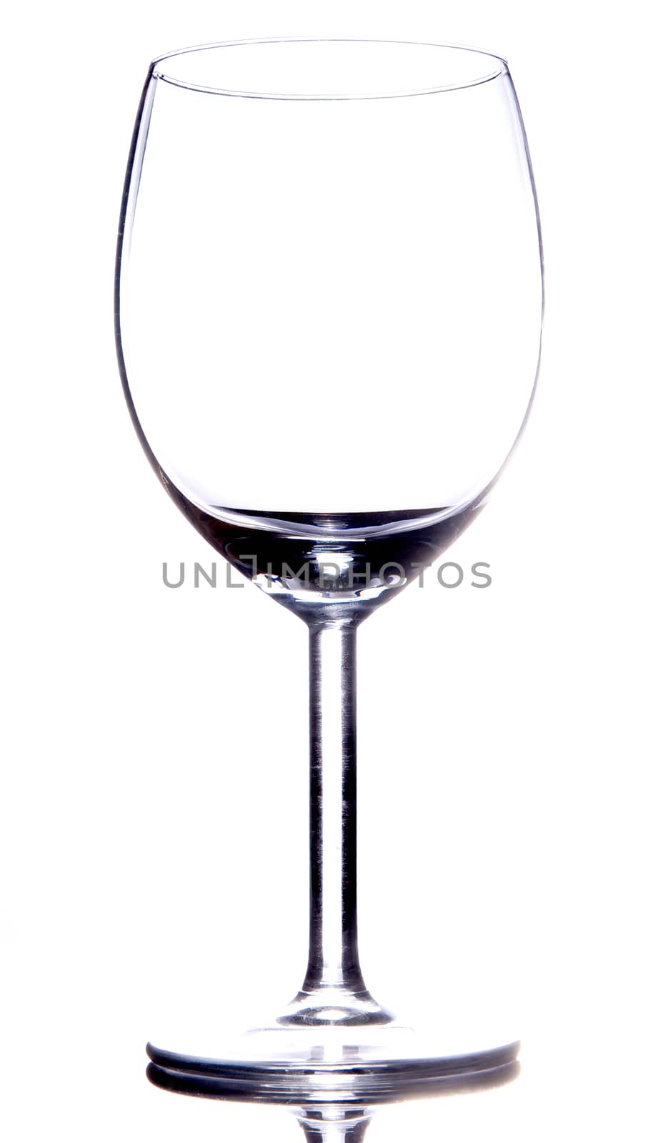 Empty vine glass on white