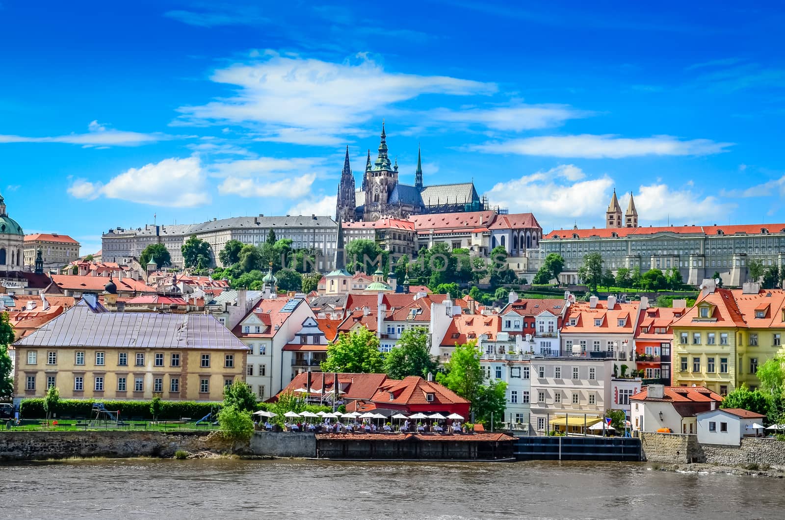 View of colorful old town and Prague castle with river, Czech Republic