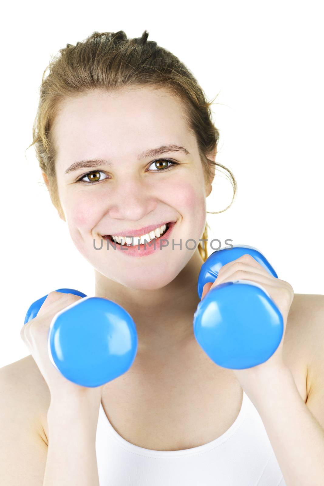 Happy active girl exercising with weights by elenathewise