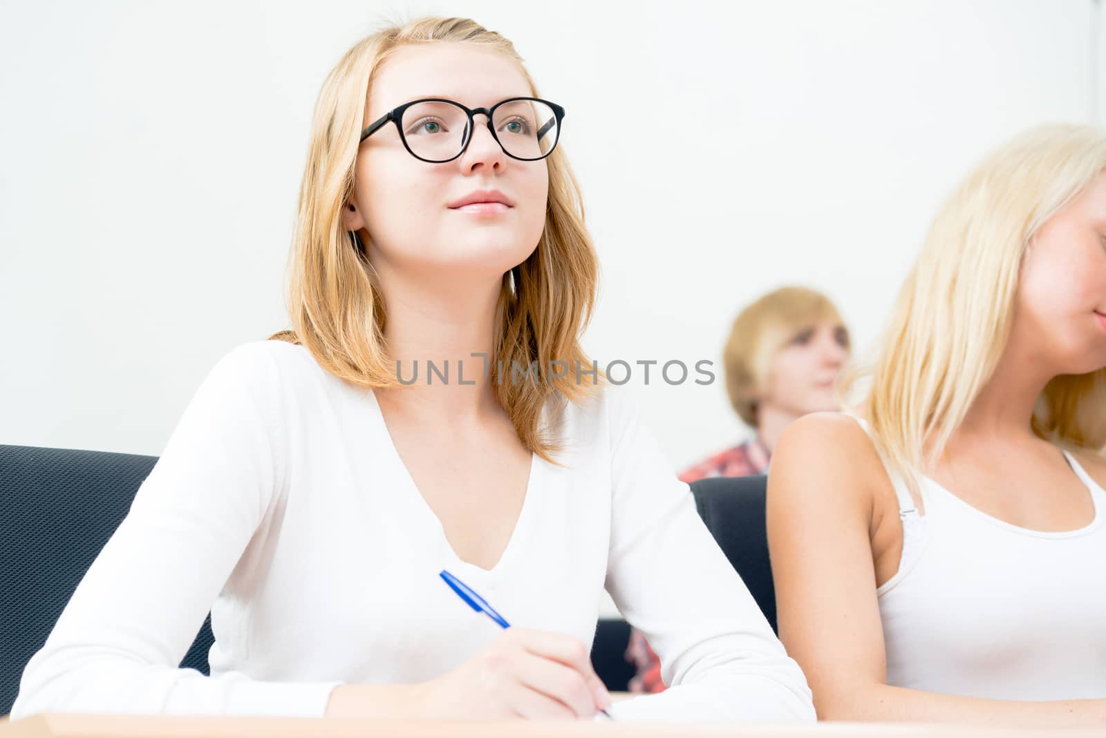 image of a young female students in the classroom, teaching at the University of