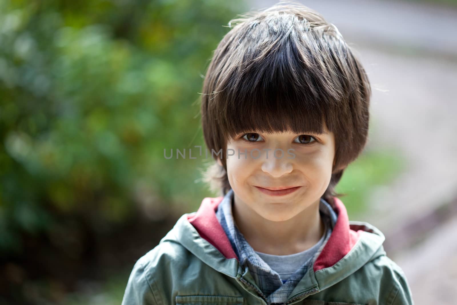 Closeup portrait of happy little boy smiling 