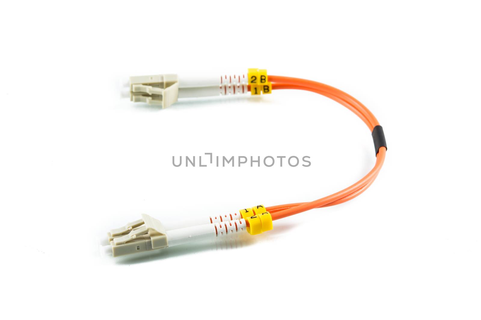 Fiber optic single mode patch cord on white background