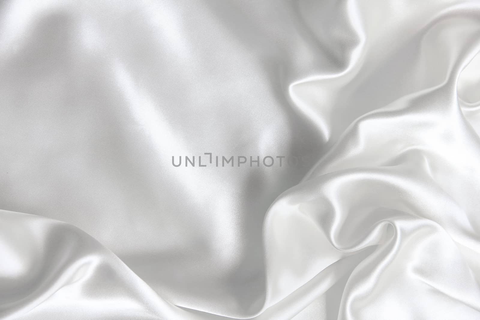 Smooth elegant white silk can use as wedding background 