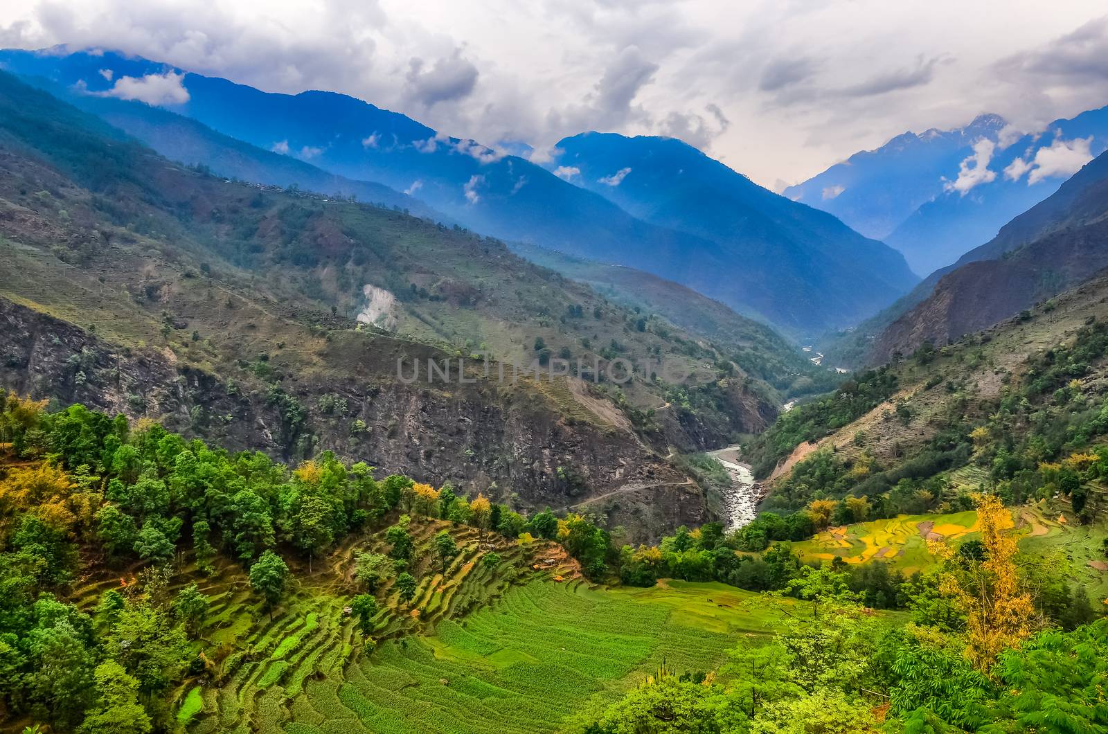 Tropical mountain landscape with fields in Nepal by martinm303