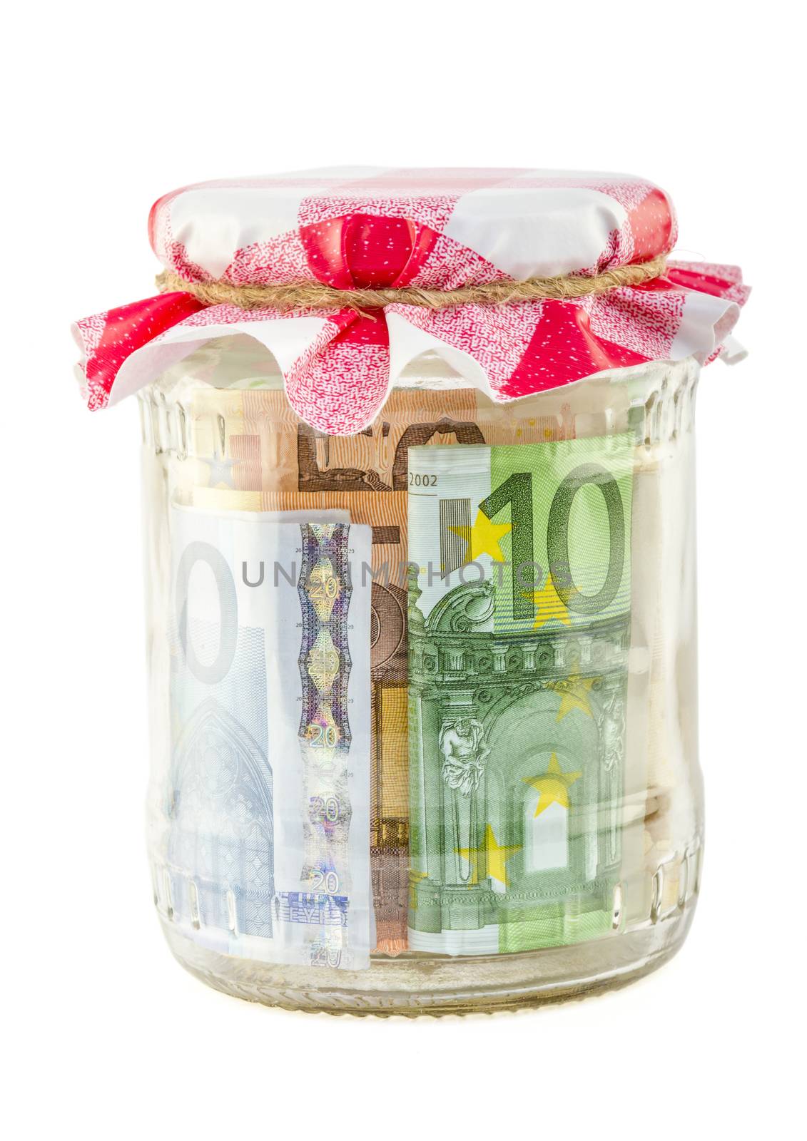 financial reserves money conserved in a glass jar by manaemedia