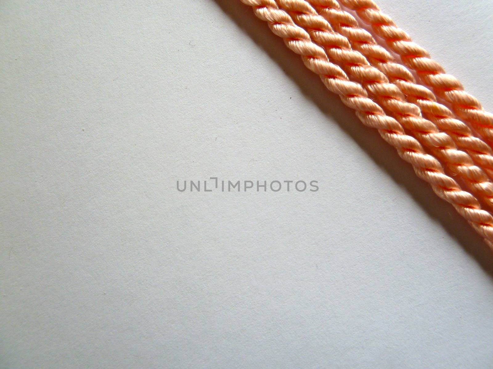 Bright orange ropes in a diagonal design