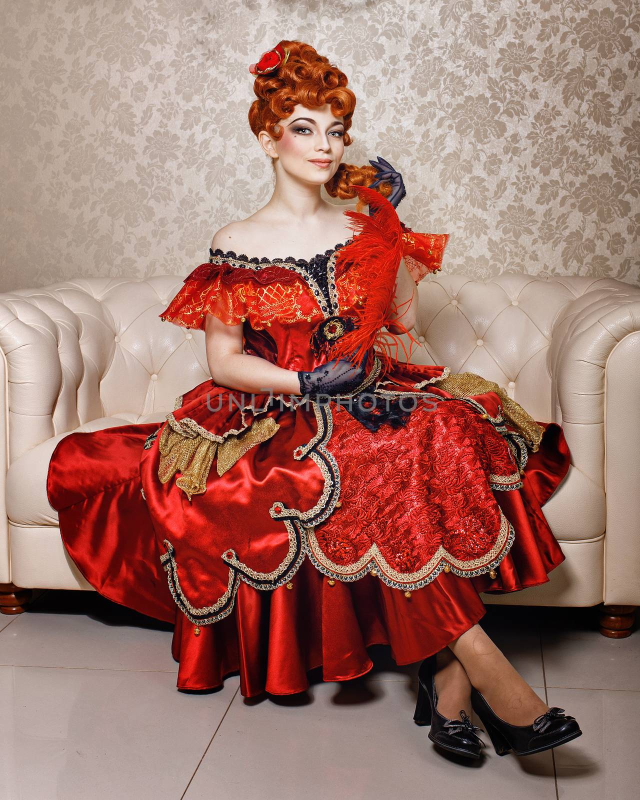 Attractive girl red dress and red wig courtesan
