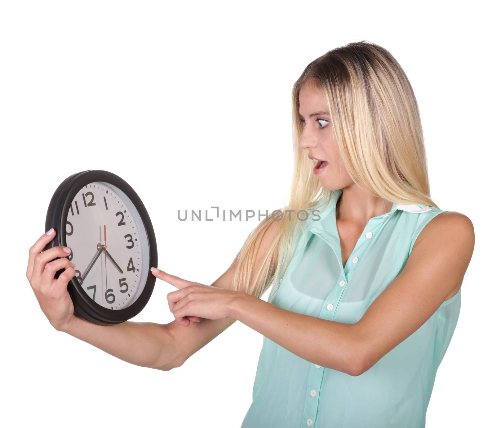 Young woman poiting to the time on a clock concept