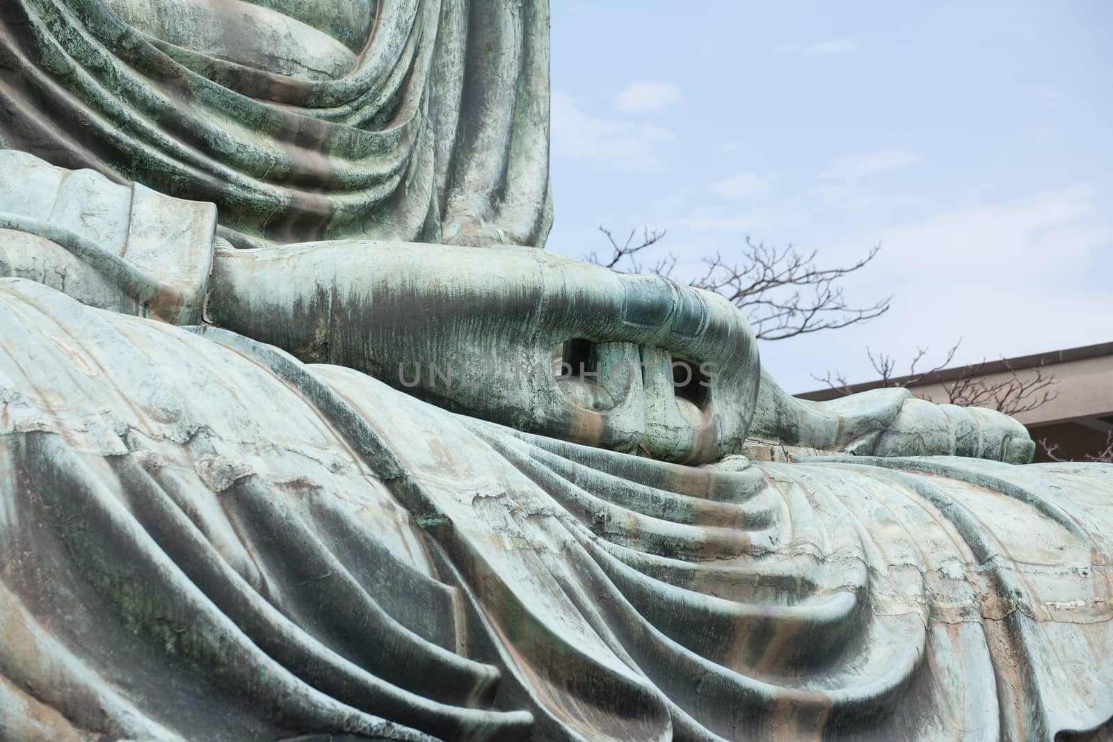 Hand close-up of the Daibutsu in Kamakura - Japan by 2nix