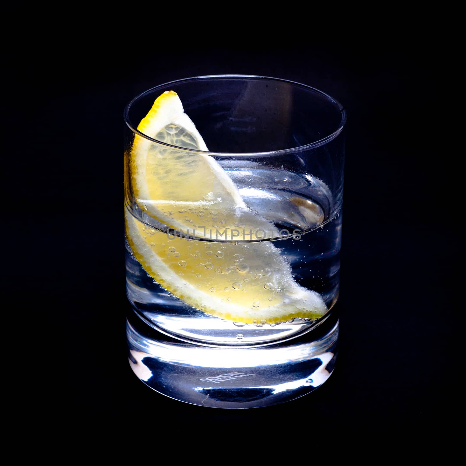 fresh mojito Cocktail with lemon isolated on black background