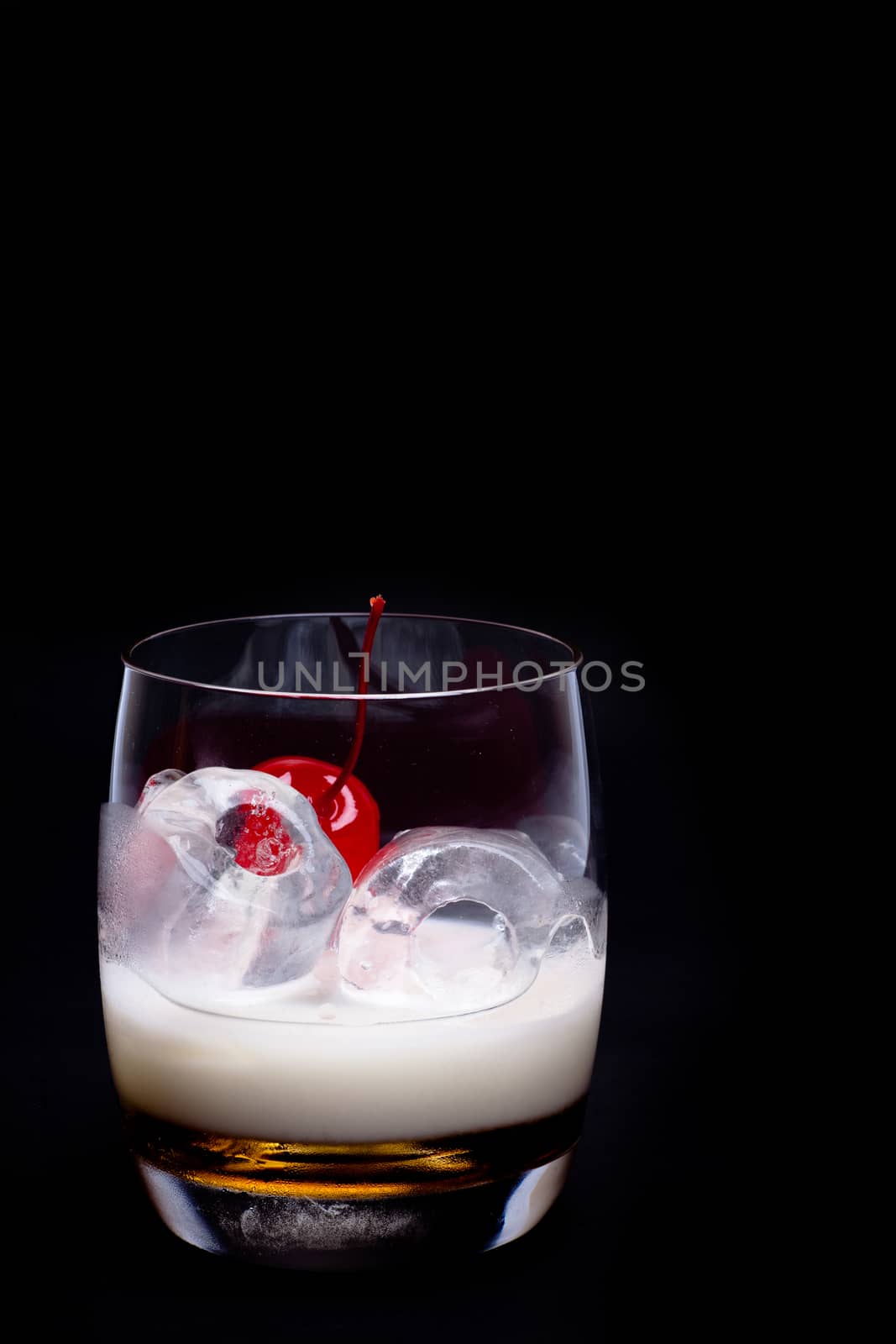 White Russian Cocktail - isolated on black
