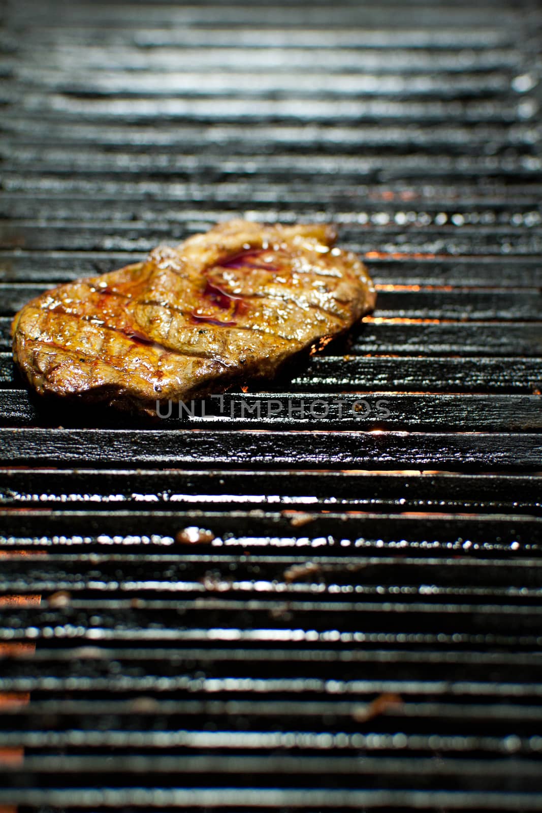 closeup of a steak on a grill