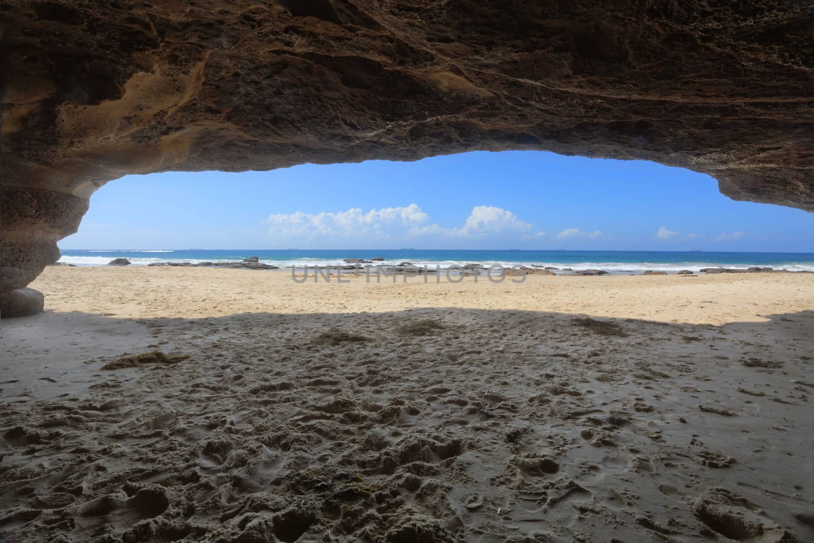 Inside one of the caves at Caves Beach NSW Australia at low tide