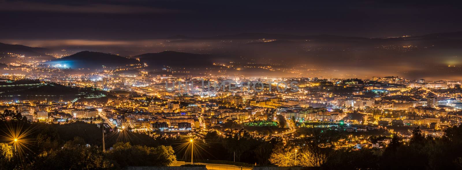 Panorama of lighted city of Braga at night, Portugal