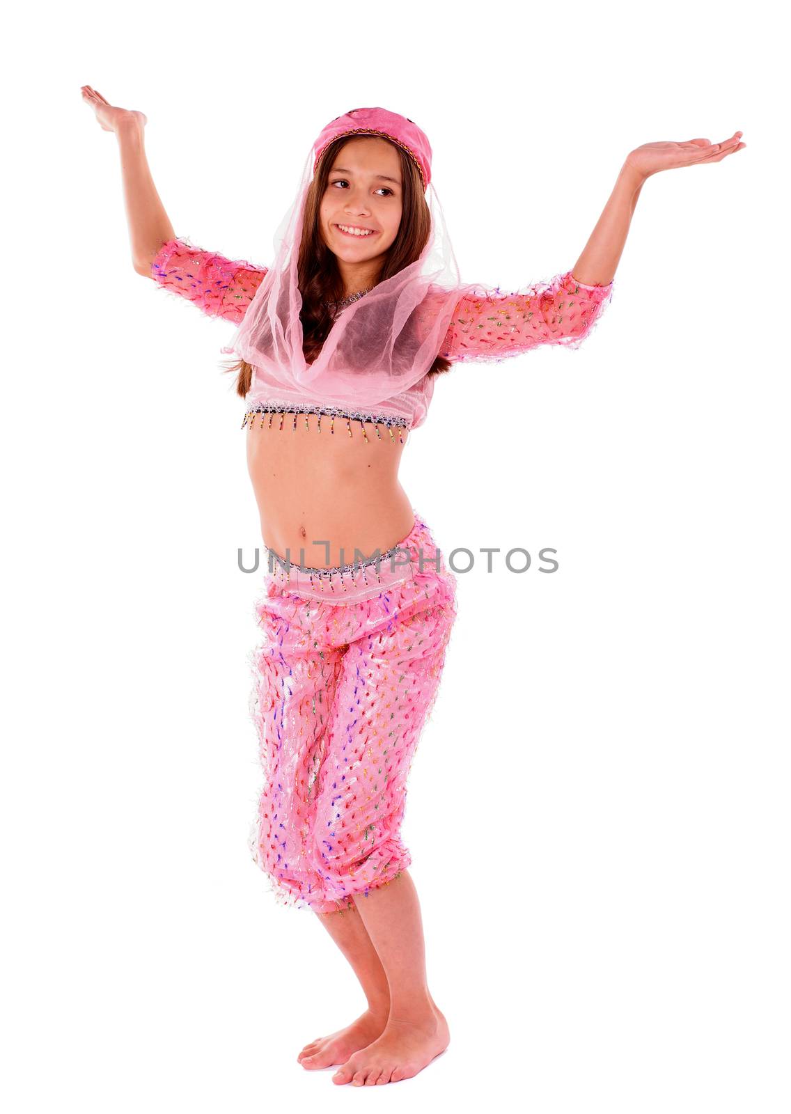 Young Girl Doing Dance Pose in Pink Oriental Costume on white background