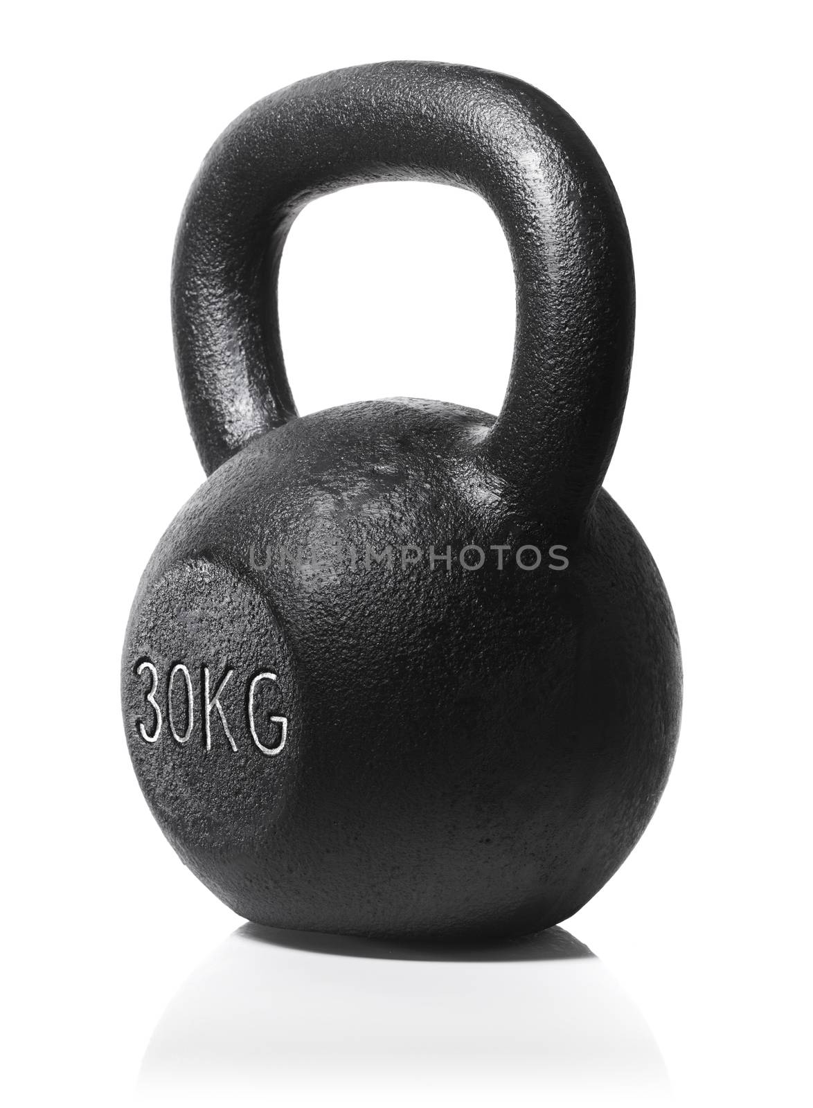 A rough and tough heavy 30 kg 66 lbs cast iron kettlebell isolated on white with natural reflection.