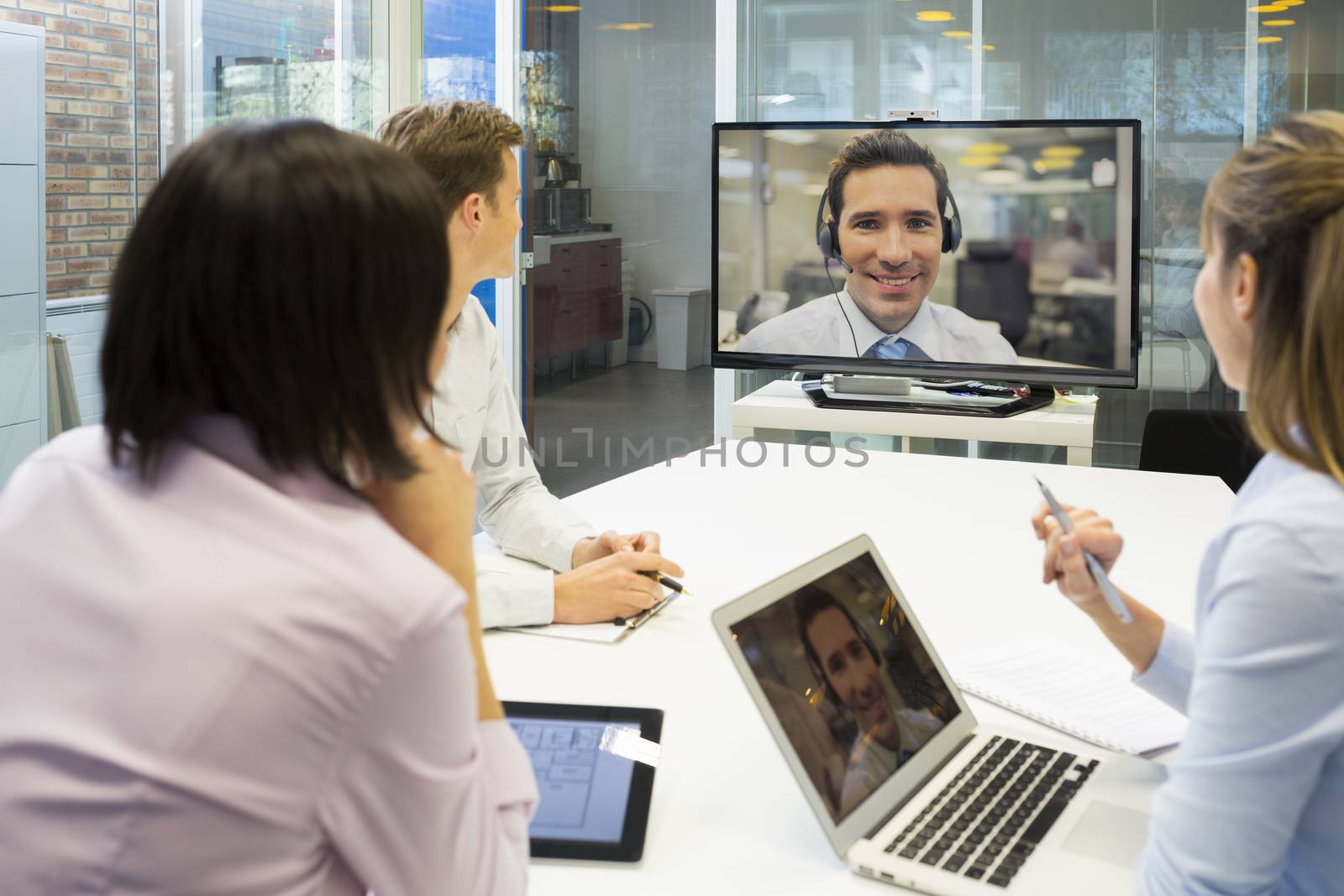 Businesswoman businessman desk chat colleagues