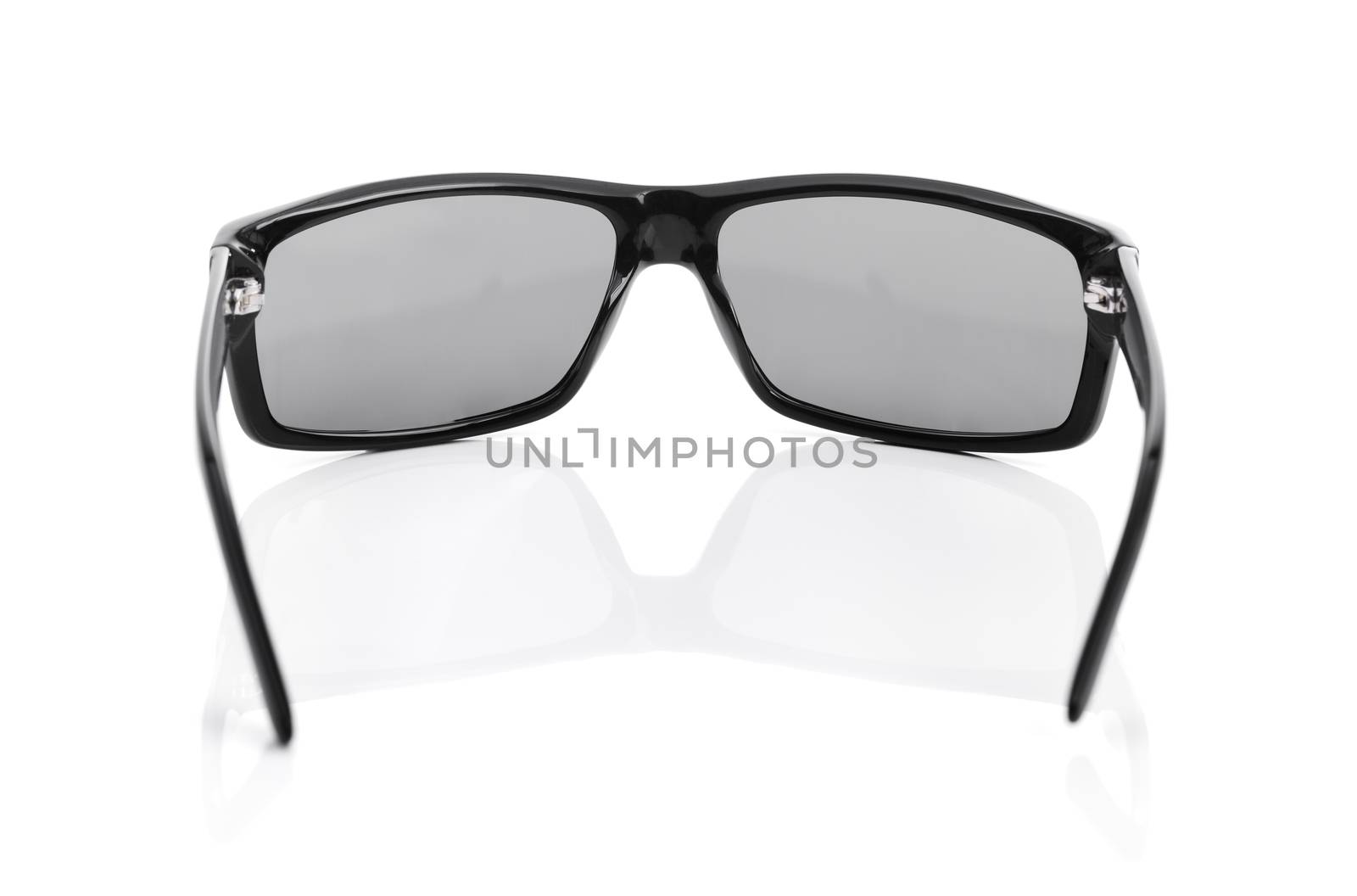 A Pair of quality Sunglasses on white with natural reflection. Short depth-of-field.