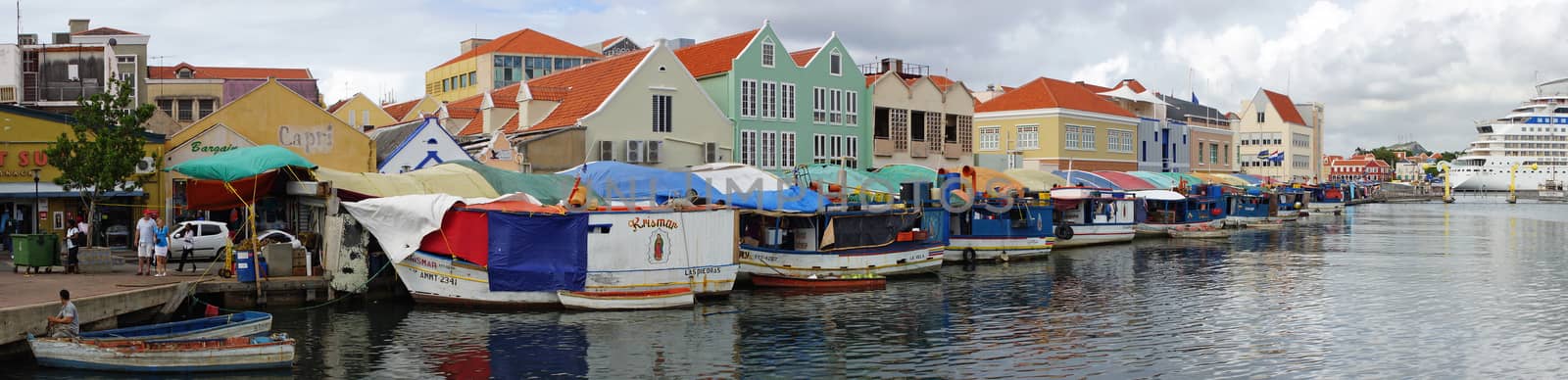 WILLEMSTAD, CURACAO - DECEMBER 10, 2013: Floating Market on the harbor of Willemstad on December 10, 2013 in Curacao, ABC Islands