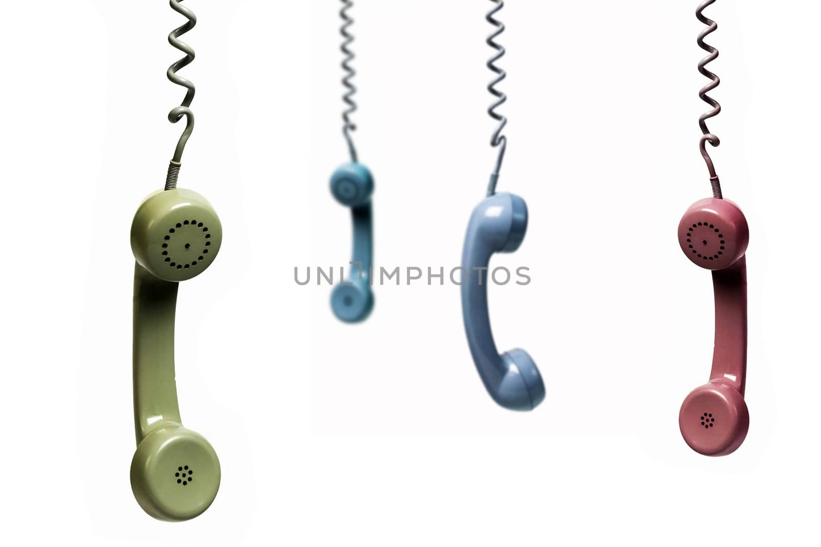 Four phones hanging from several colors isolated on a white back by digicomphoto