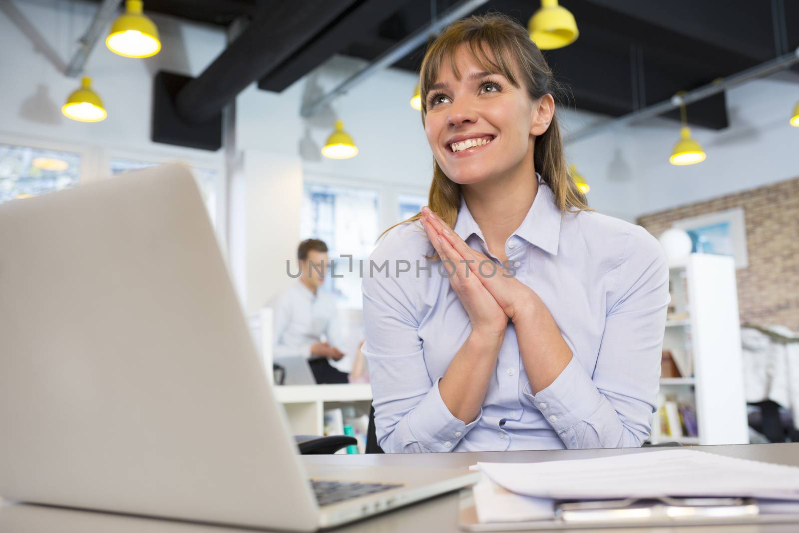 Happy Successful  businesswoman in office, with arms up by LDProd