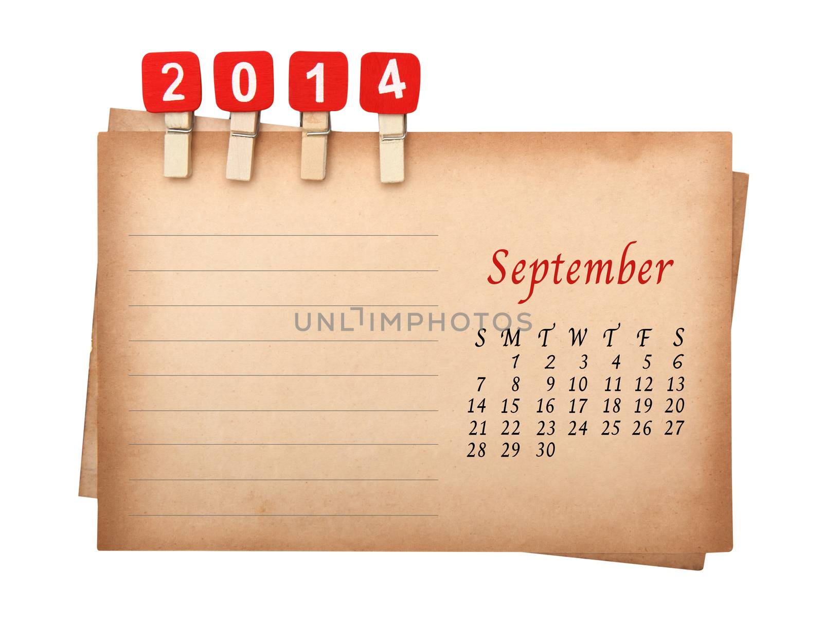 Calendar 2014 on the old paper with wooden pegs