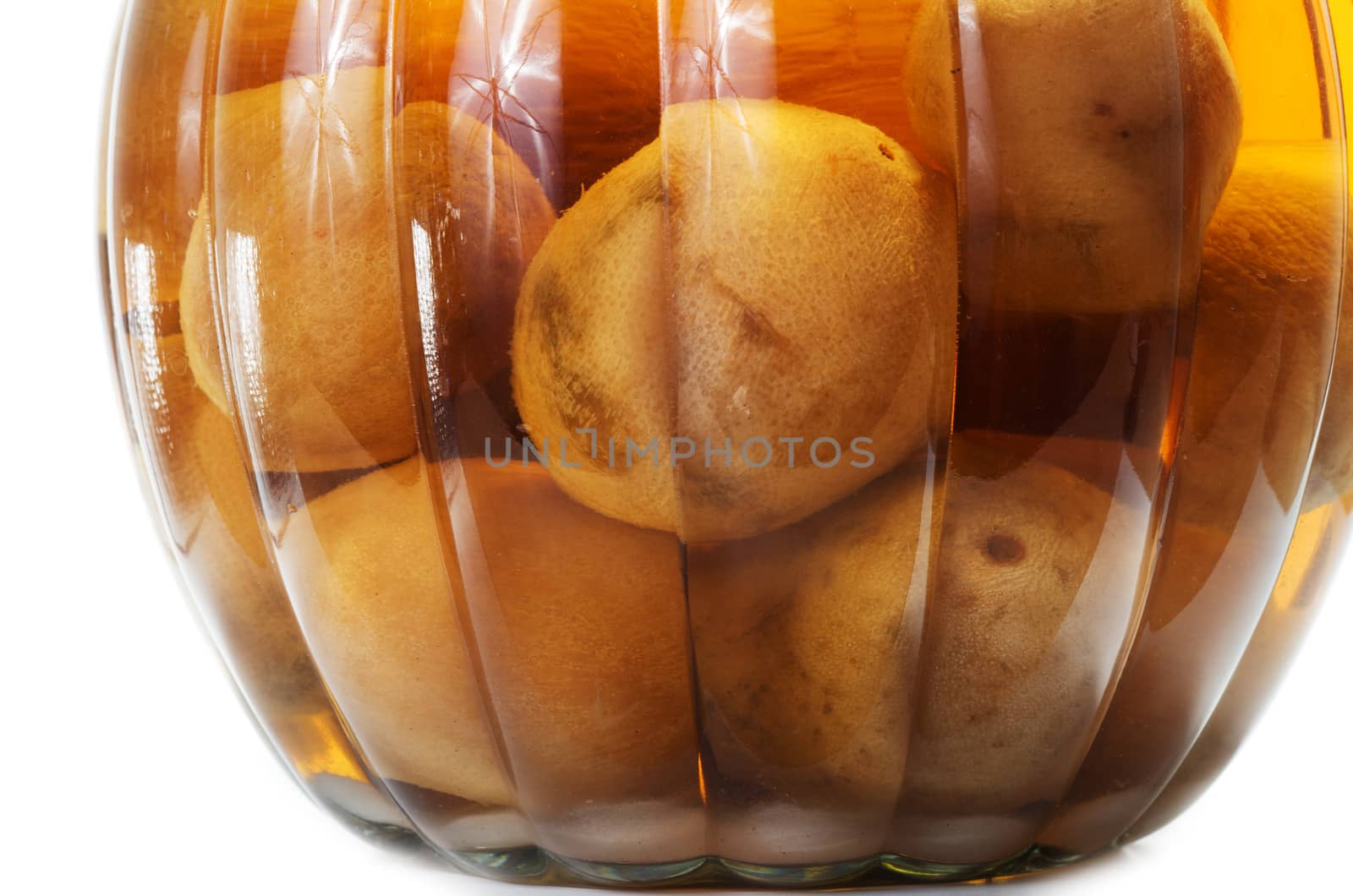 Vietnamese salted and pickled limes in a glass jar