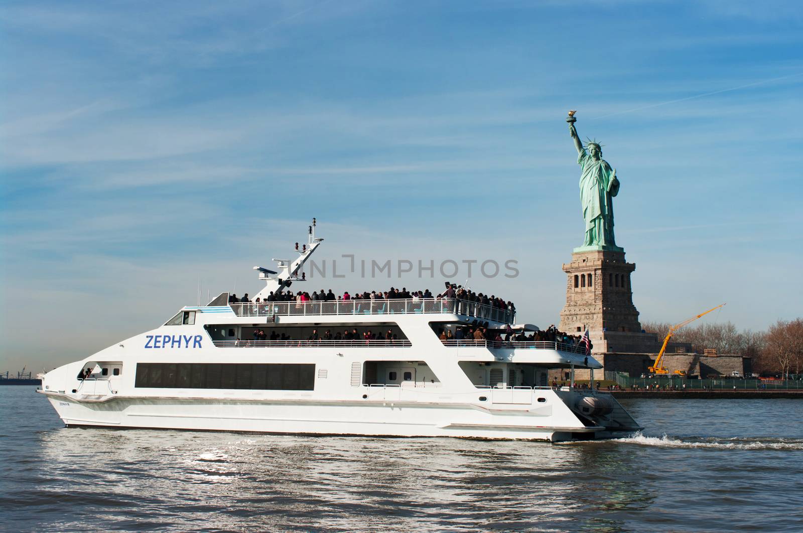 NEW YORK - NOVEMBER 25: Luxury yacht Zephyr filled with tourist  by daoleduc