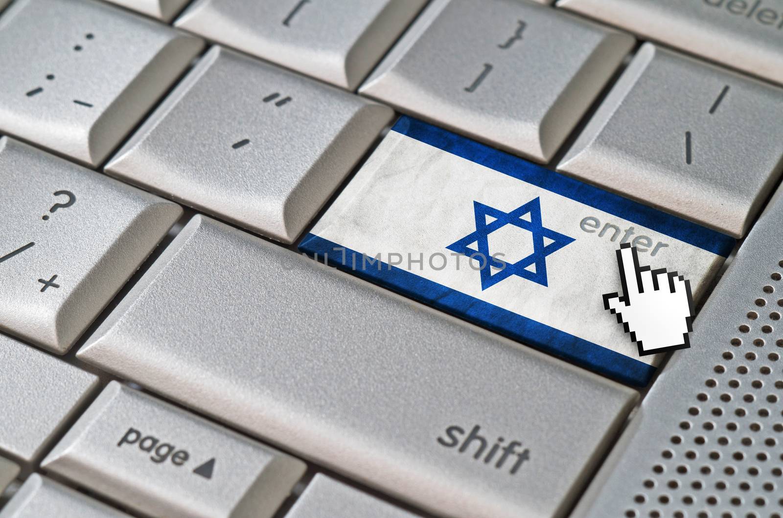 Business concept mouse cursor pressing Israel enter key on metallic keyboard