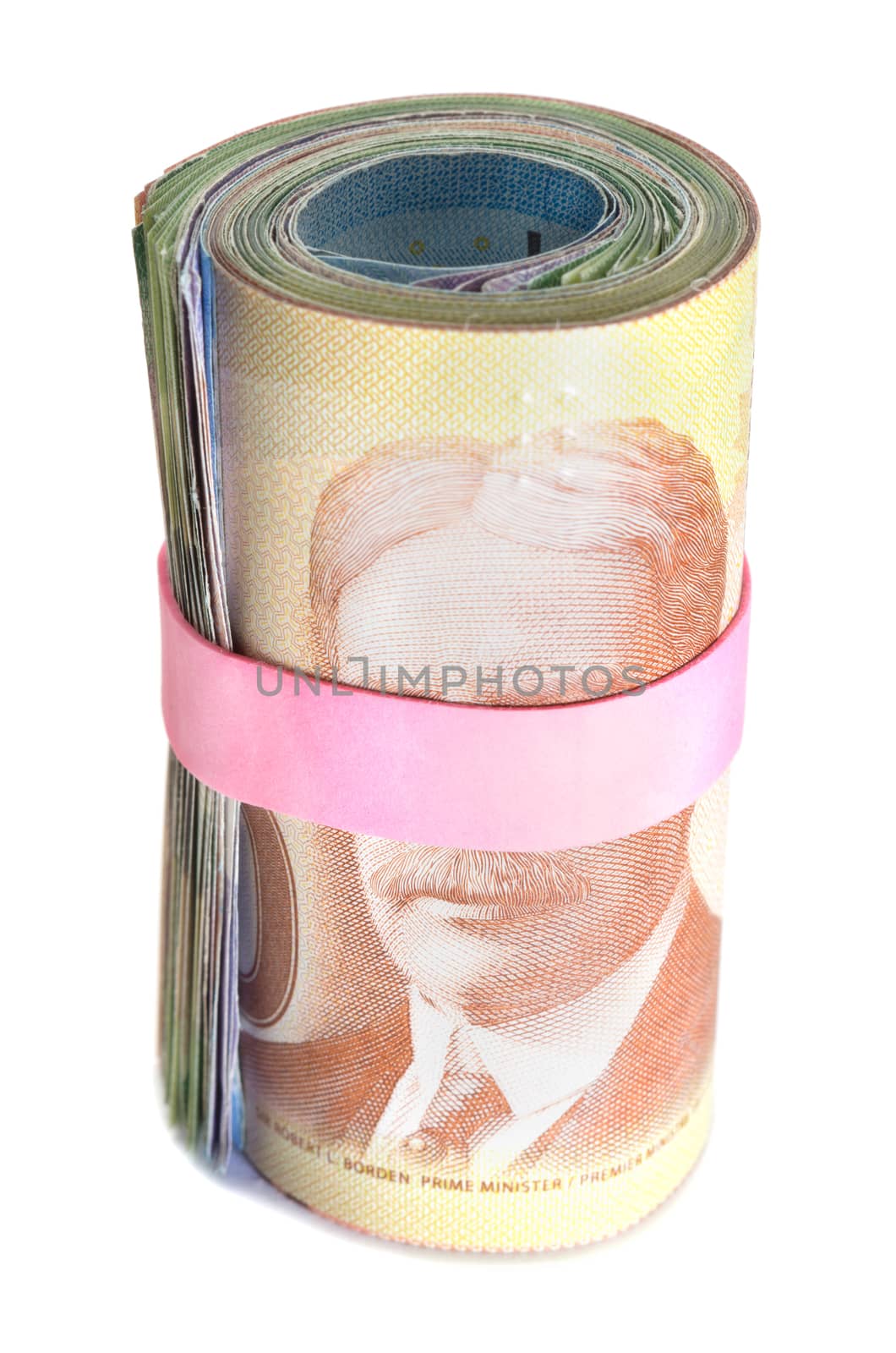 Front view of a Roll of banknotes wrapped with a pink rubber band
