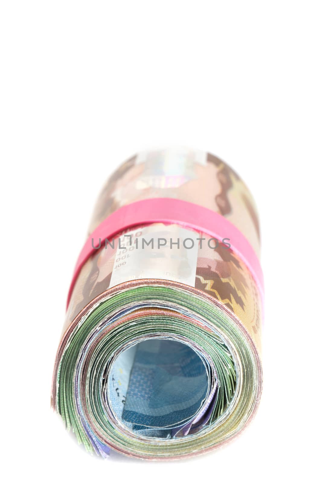 Front view of a Roll of banknotes wrapped with a pink rubber band