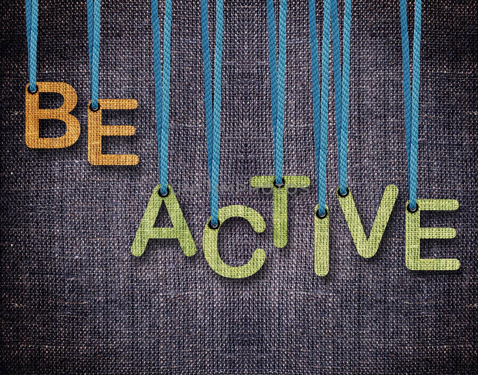 Be Active Letters hanging strings with blue sackcloth background.