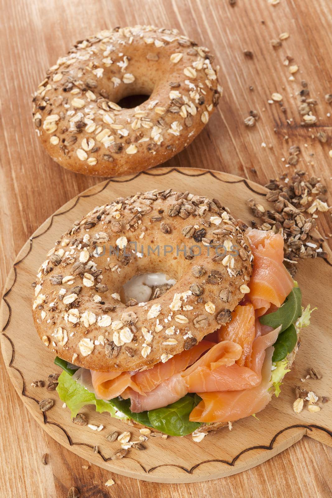 Delicious bagel with smoked salmon. Traditional amercan healthy eating. 