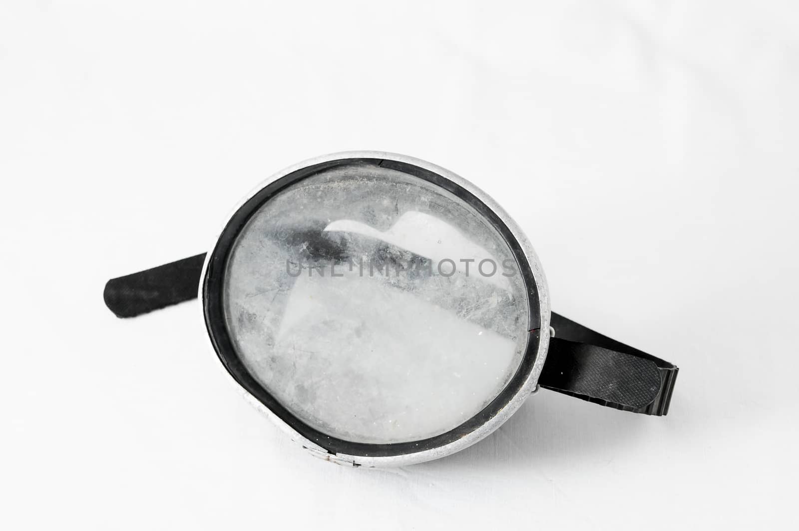 Old Vintage Dirty Diving Mask on a White Background