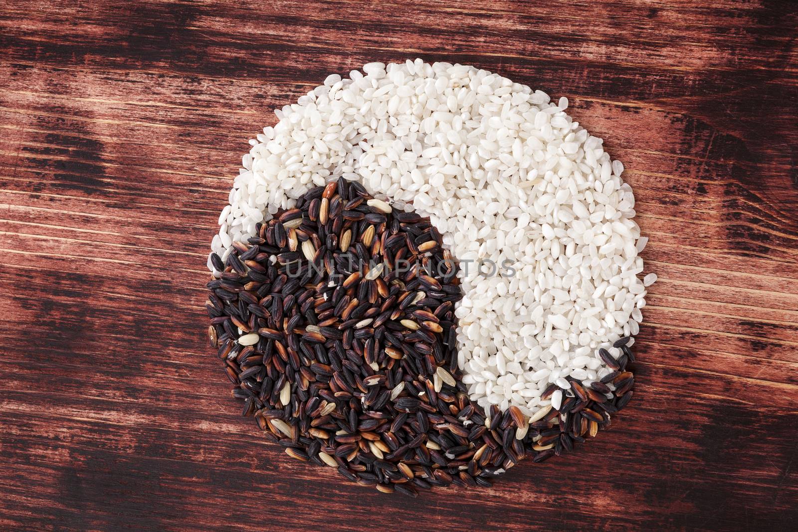 White and wild rice forming Yin Yang Symbol. Healthy balanced cooking. Traditional chinese culture.