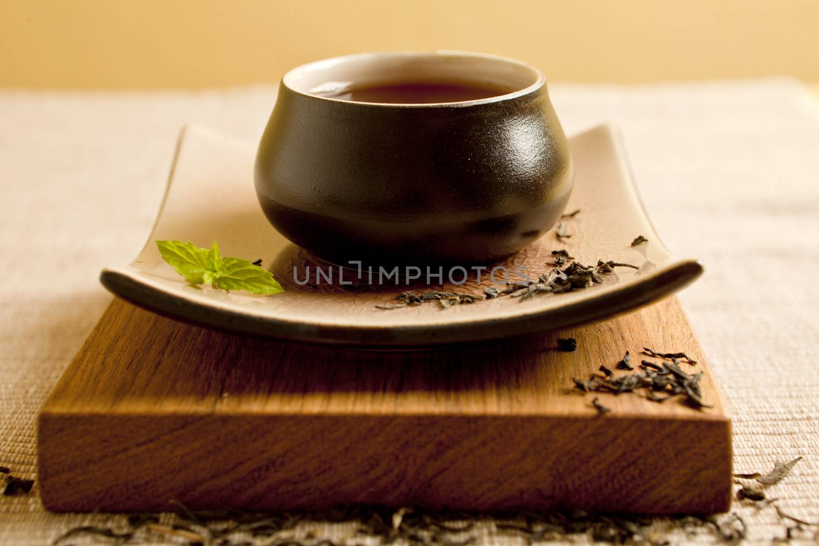 Black tea still life close up in beautifull ceramics.