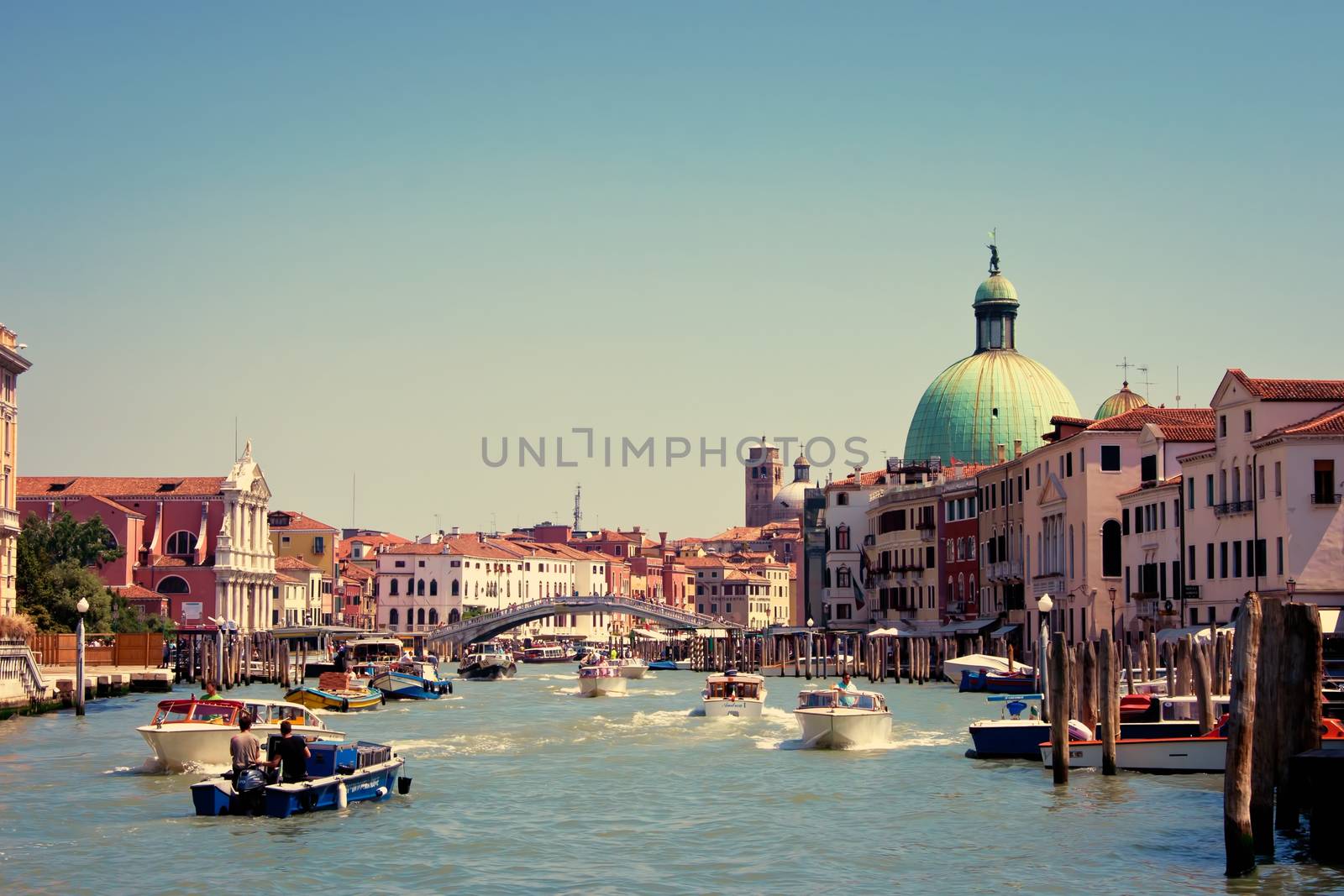 Grand Canal with boats and beautiful architecture in Venecia, Italy.