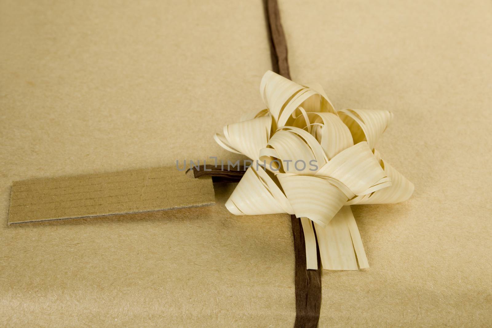 Beautifully naturally wrapped gift with name tag.