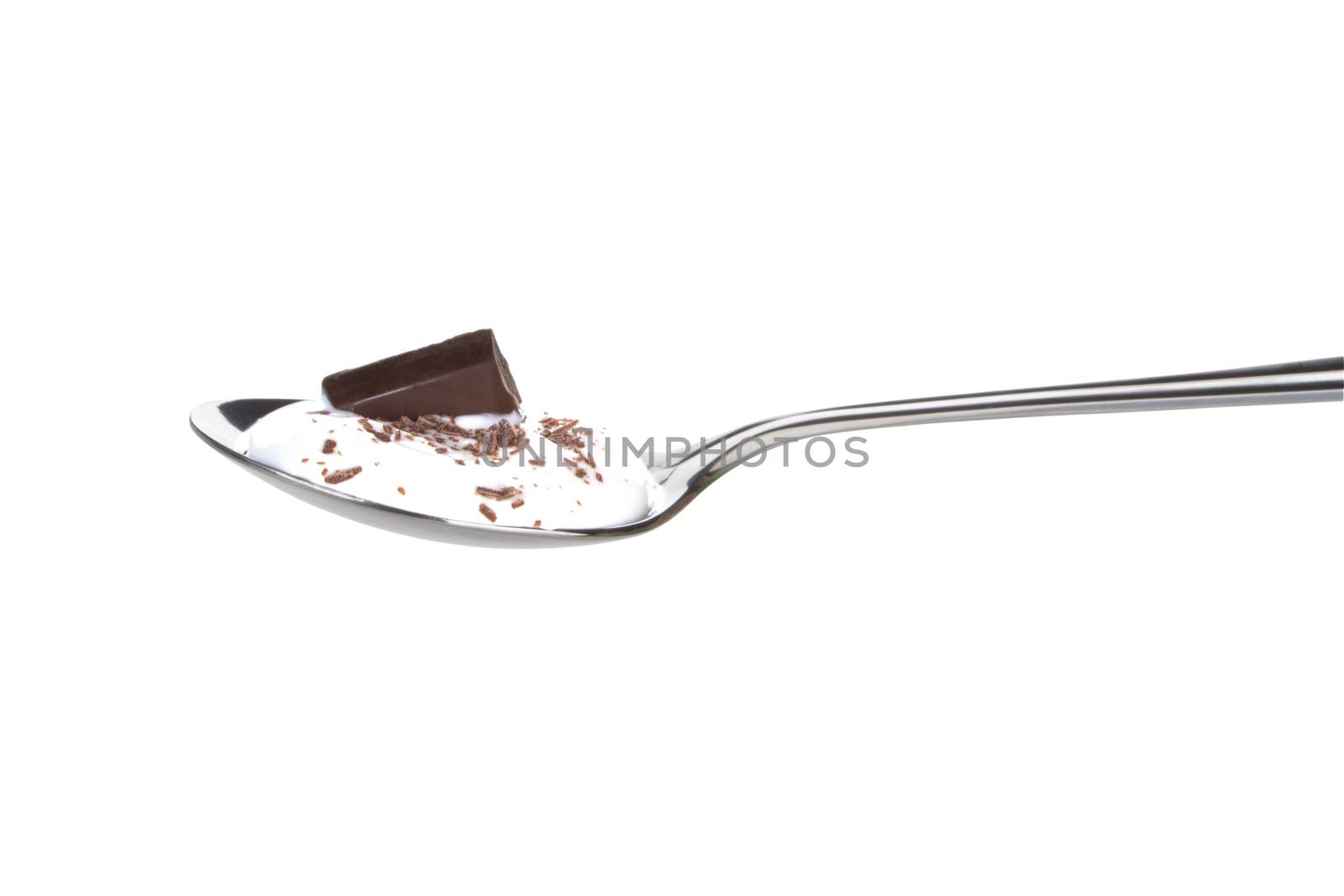 Delicious chocolate in yogurt on a spoon against white background.