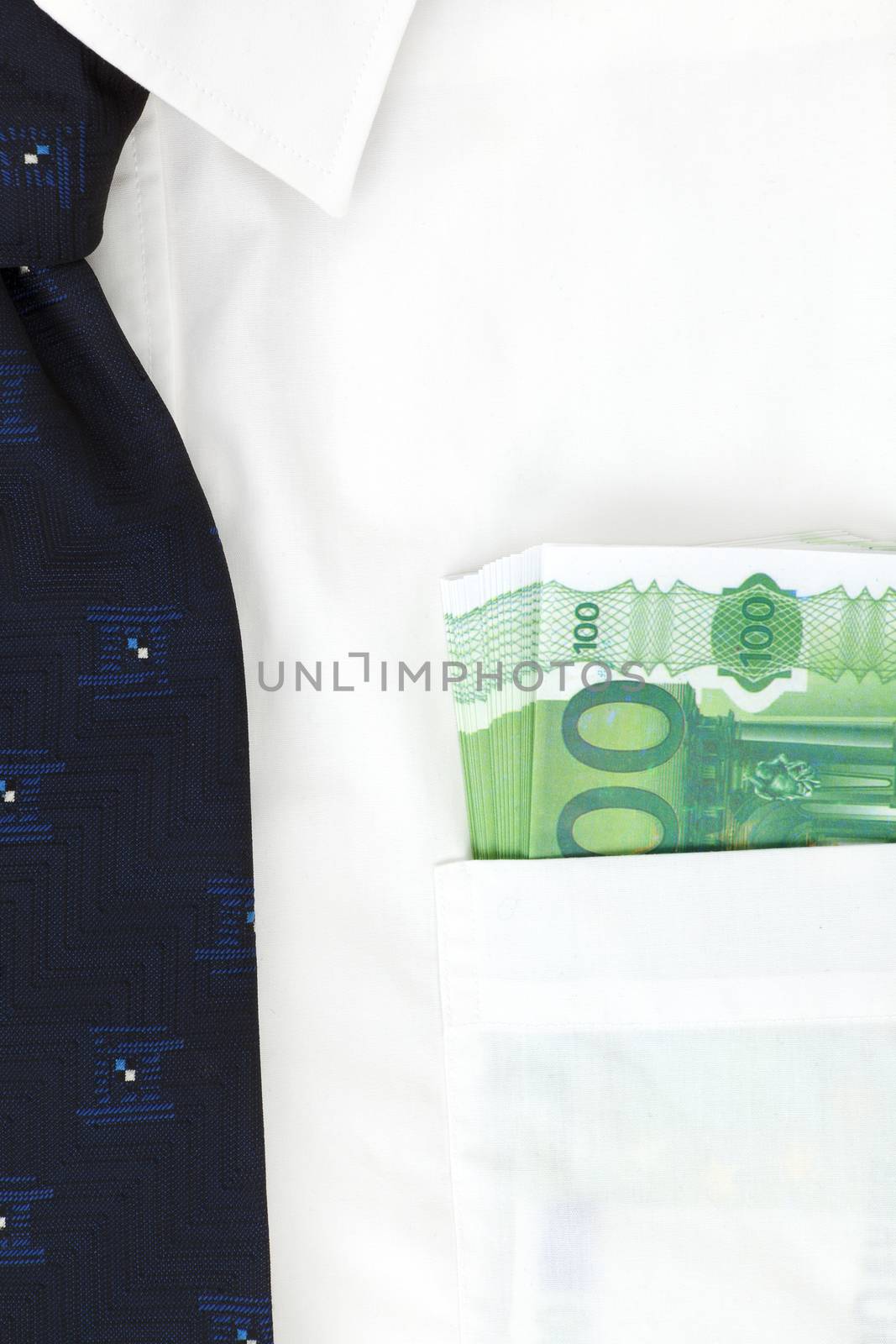 Businessman with white shirt with blue tie and money in his pocket. Salary or bribe? 