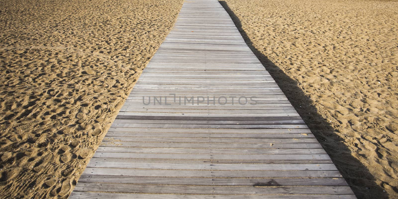 Wood bridge on beach