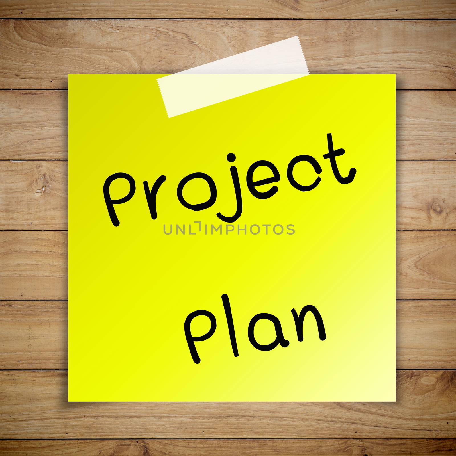 Project plan on sticky paper on Brown wood plank wall texture background