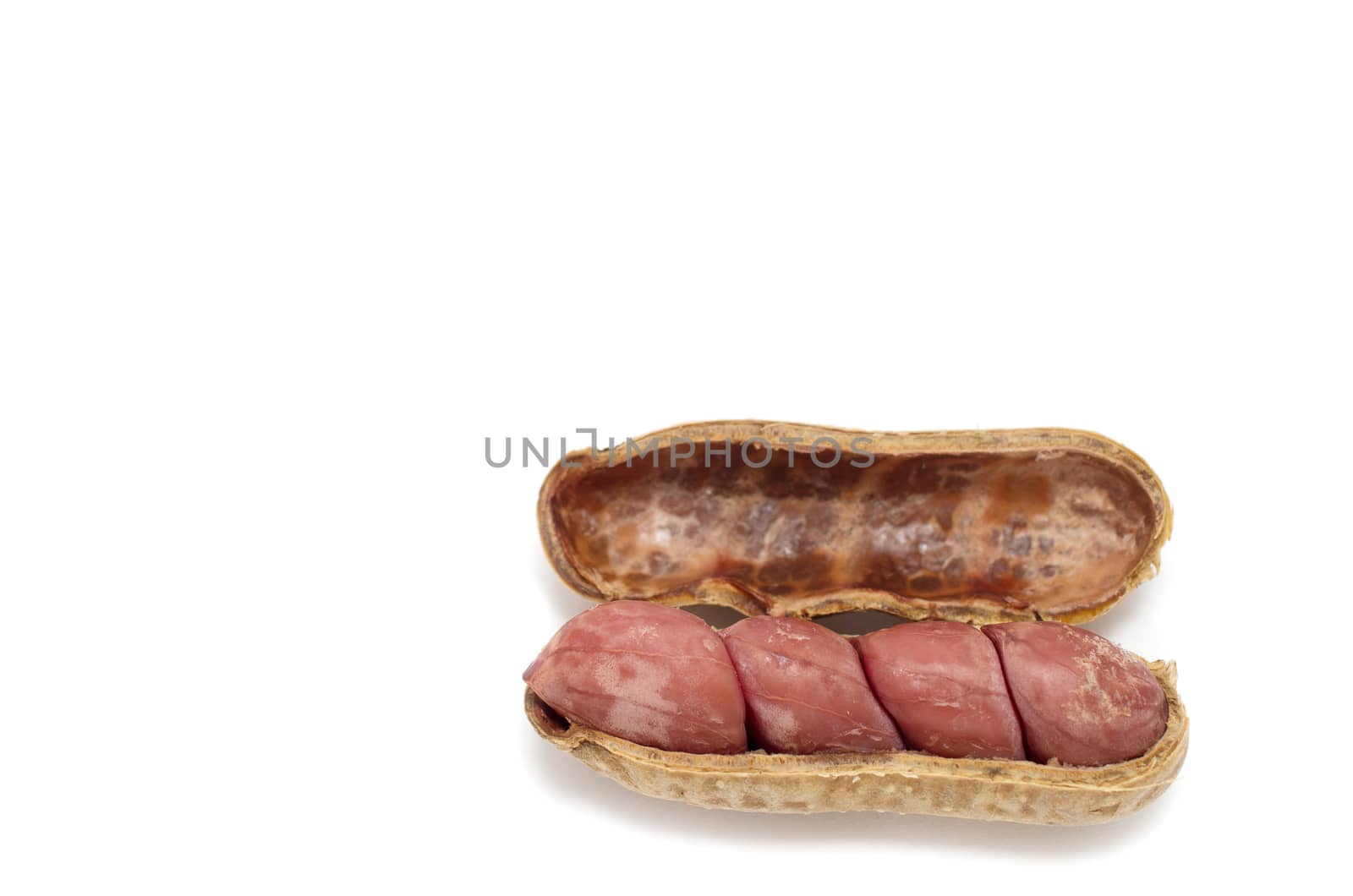 Boiled peanuts in shell on white background