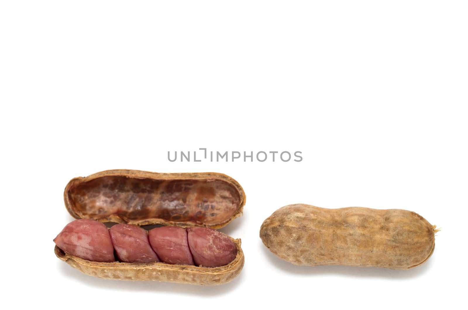 Boiled peanuts in shell on white background