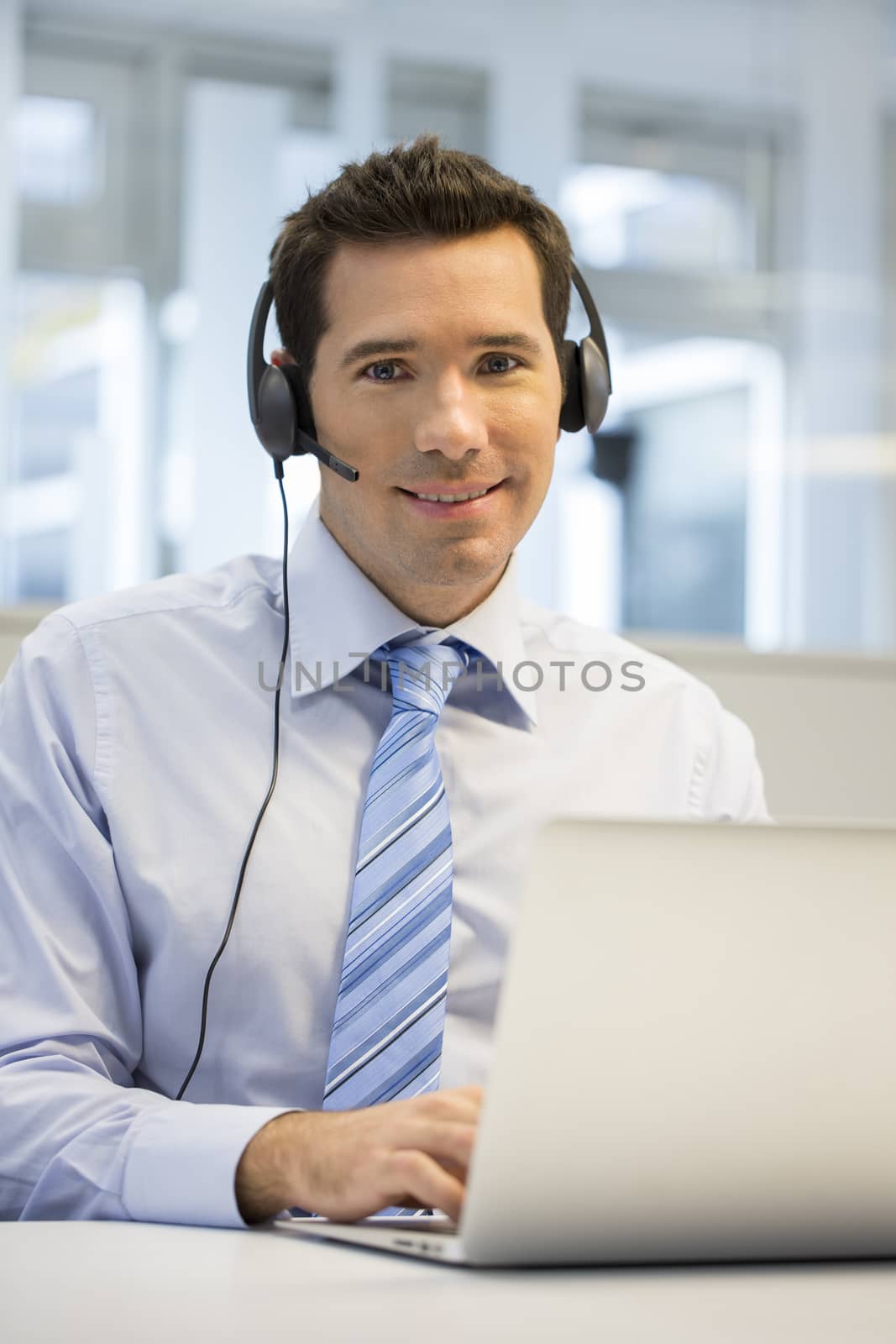 Male smiling business talk computer laptop