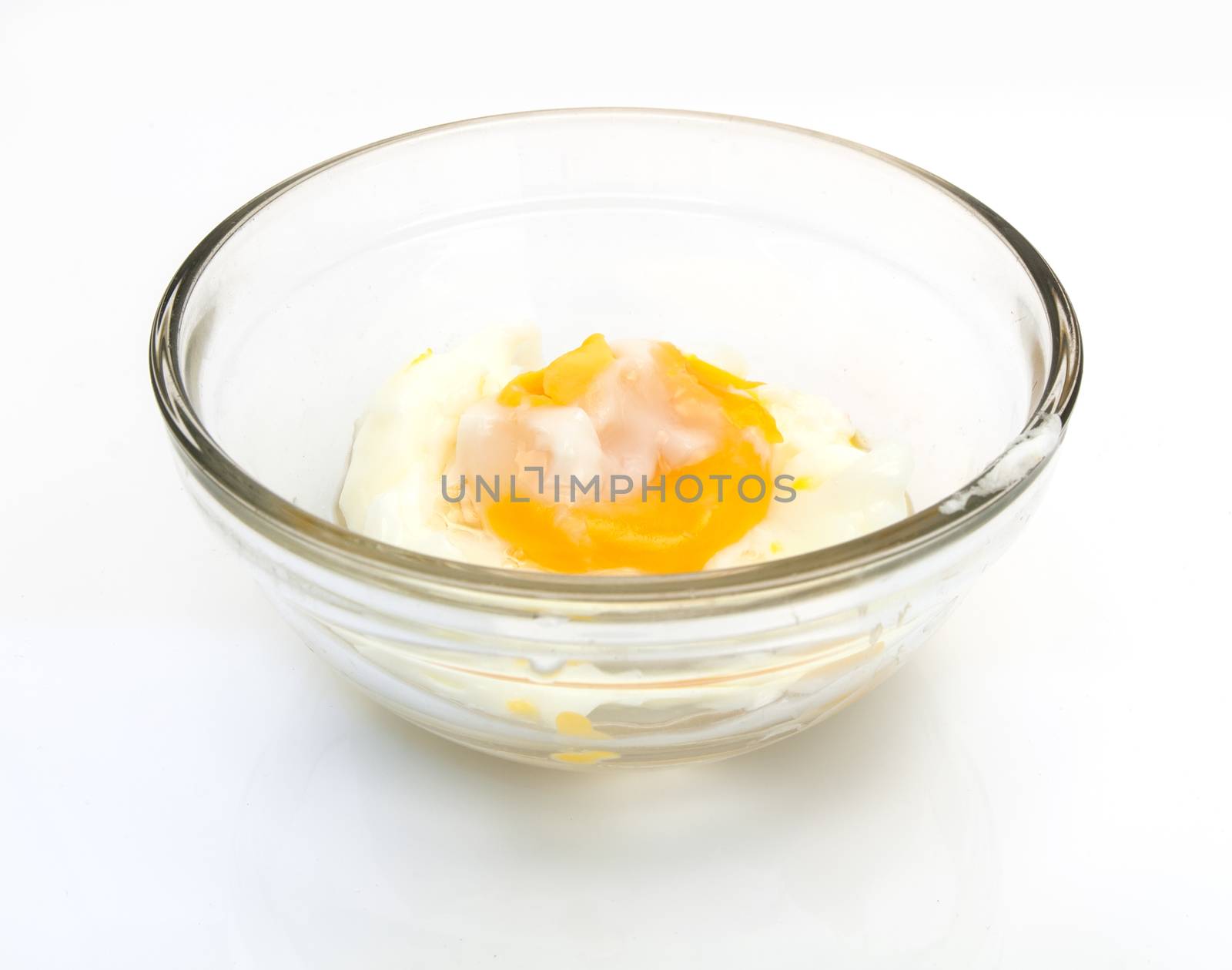 boiled eggs in cups isolated on white background
